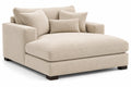 Canapé méridienne en tissu beige avec coussins